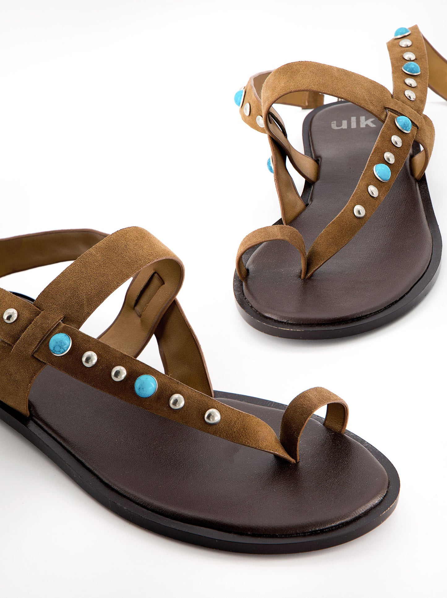 Sandalias planas de piel con remaches turquesa - Poman