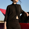 Camisa fluida negra con bajo ajustable - Kaika