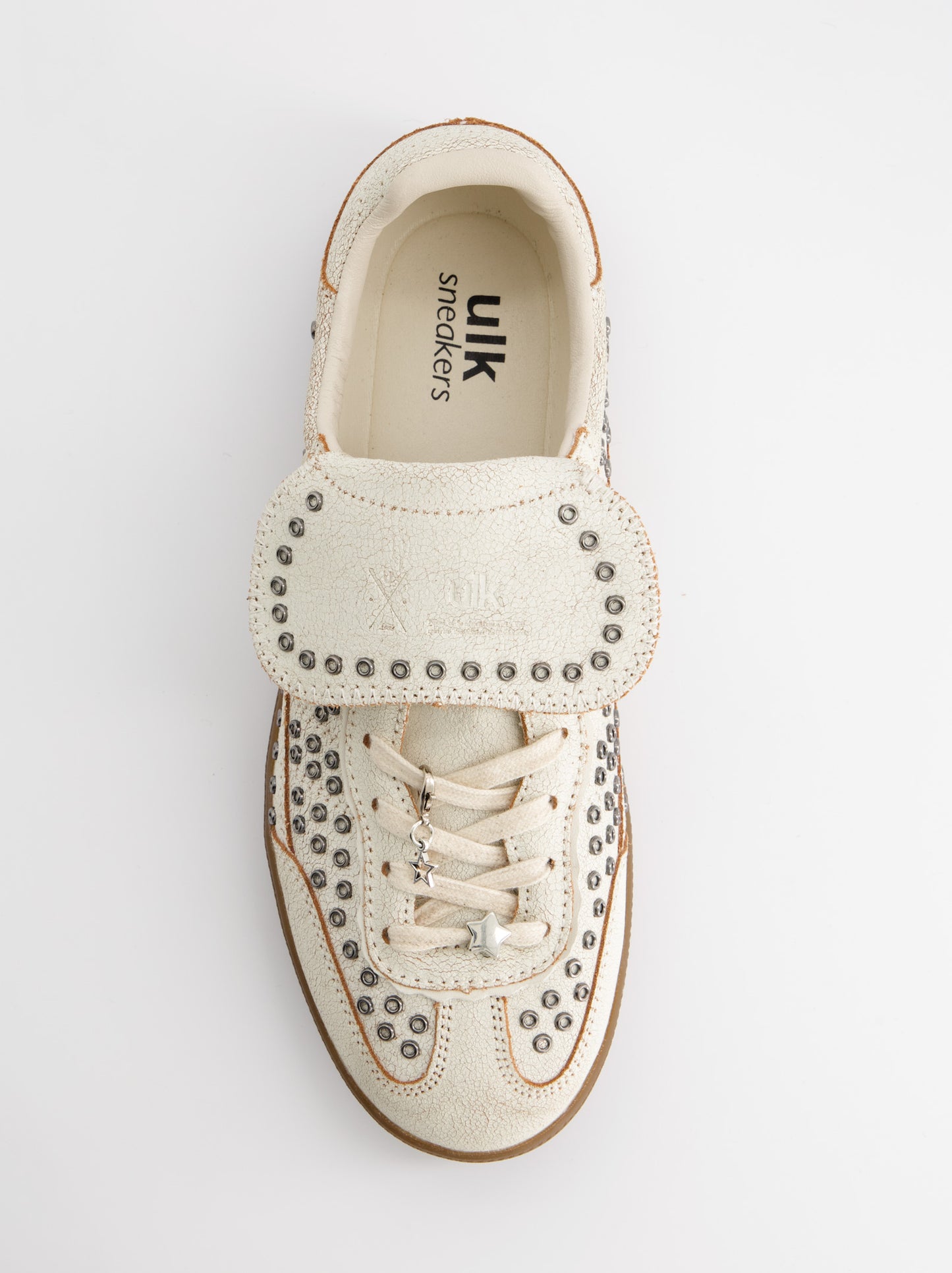 Zapatillas blancas de piel con tachuelas - Chile