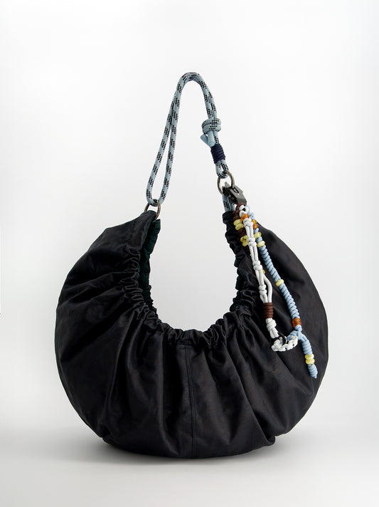 Bolso fruncido reversible con charms - Carmelo