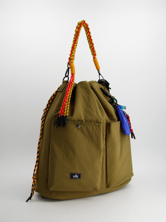 Bolso-mochila convertible con charm - Rocket