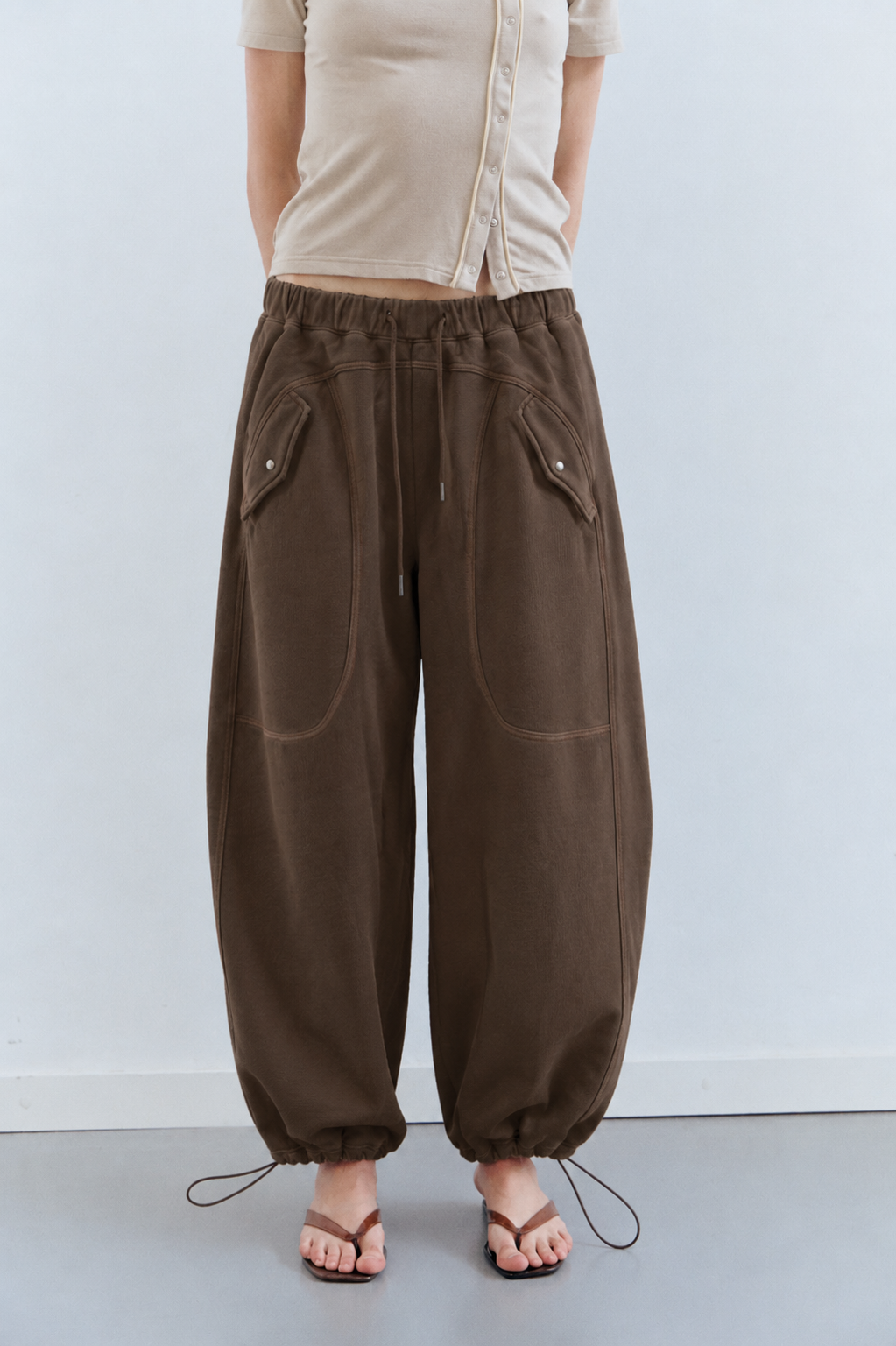 Pantalones jogger parachute ajustables Cloud