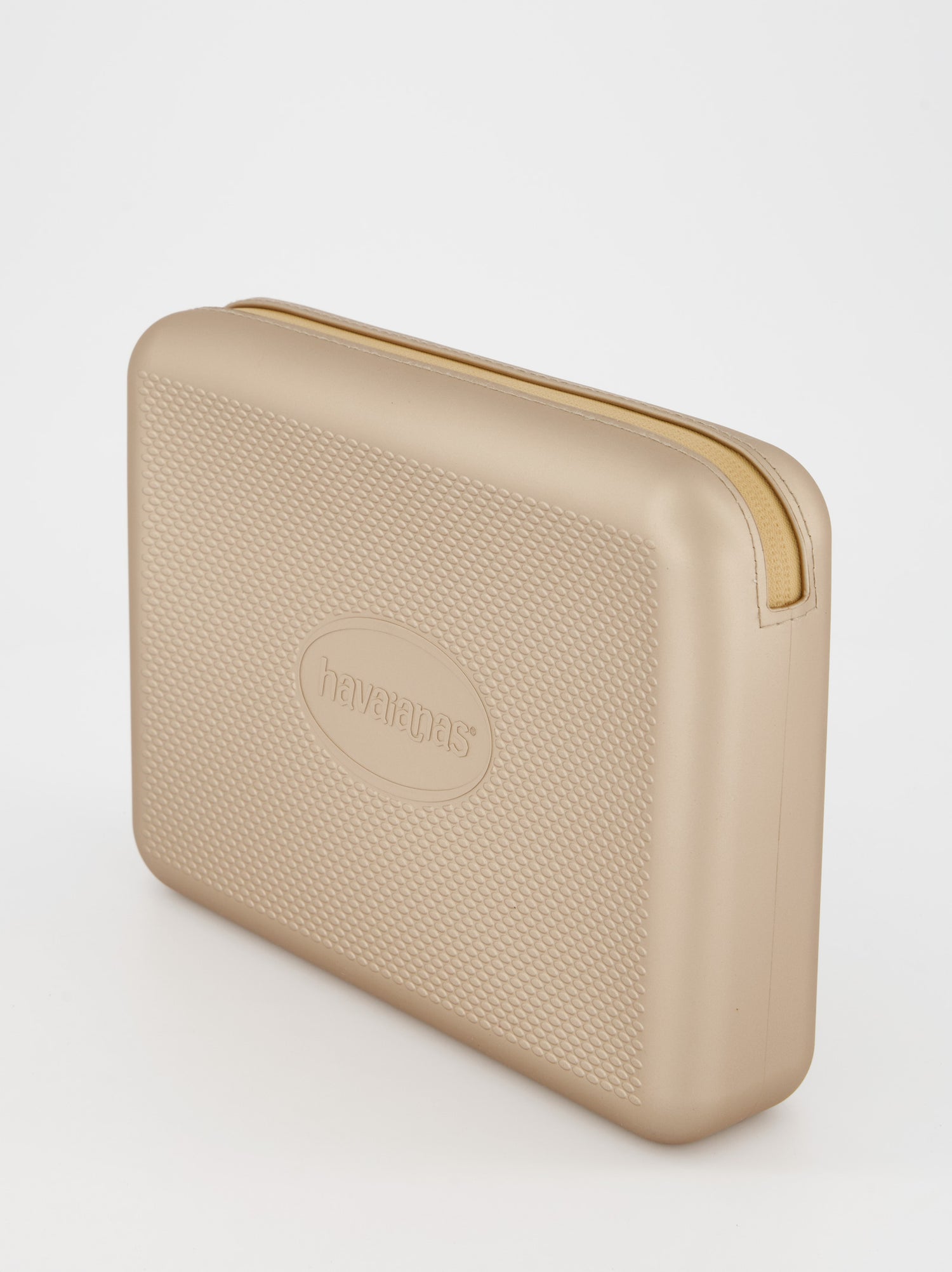 Neceser de goma dorado de Havaianas