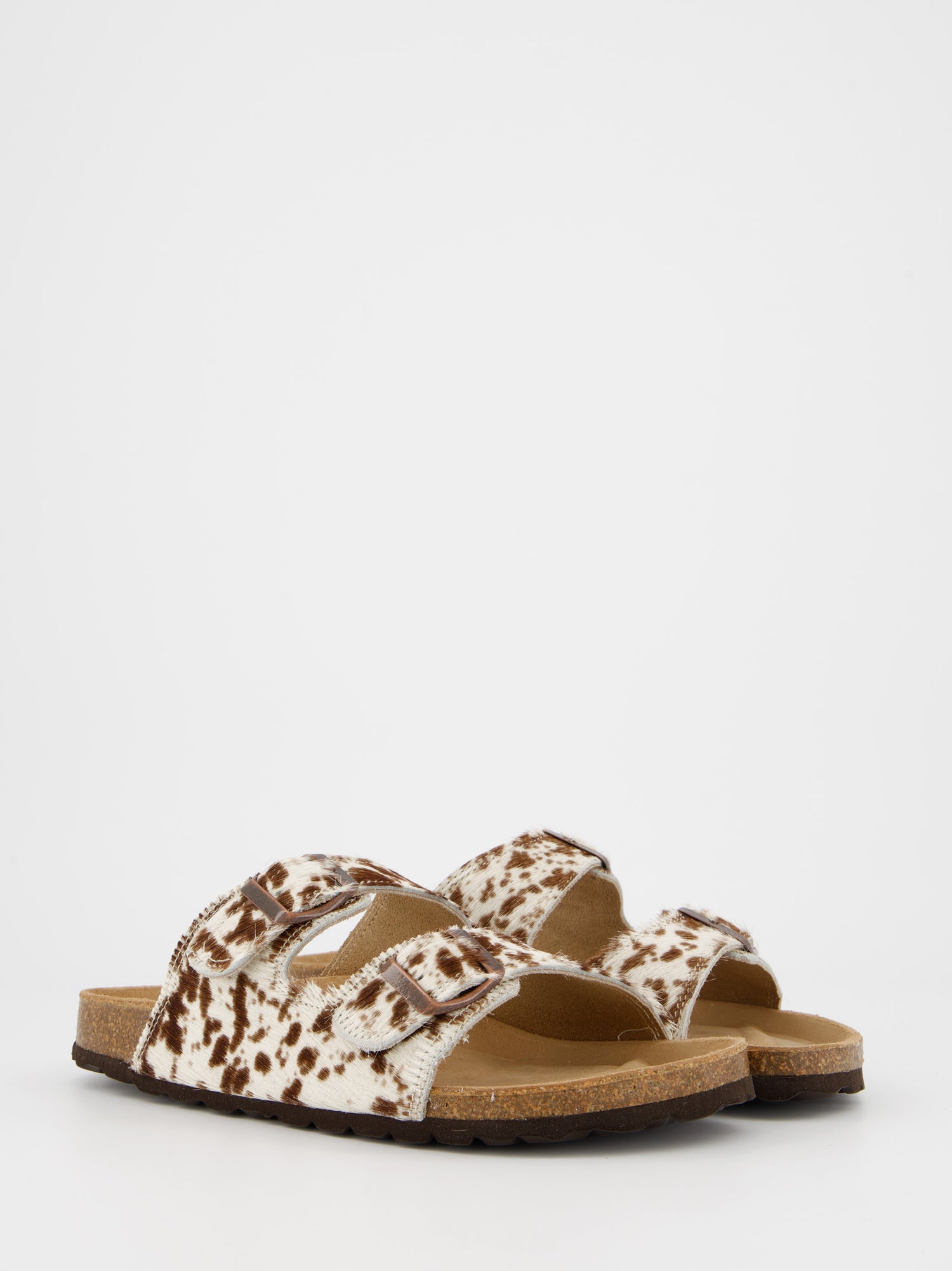 Sandalias planas de pelo con estampado animal