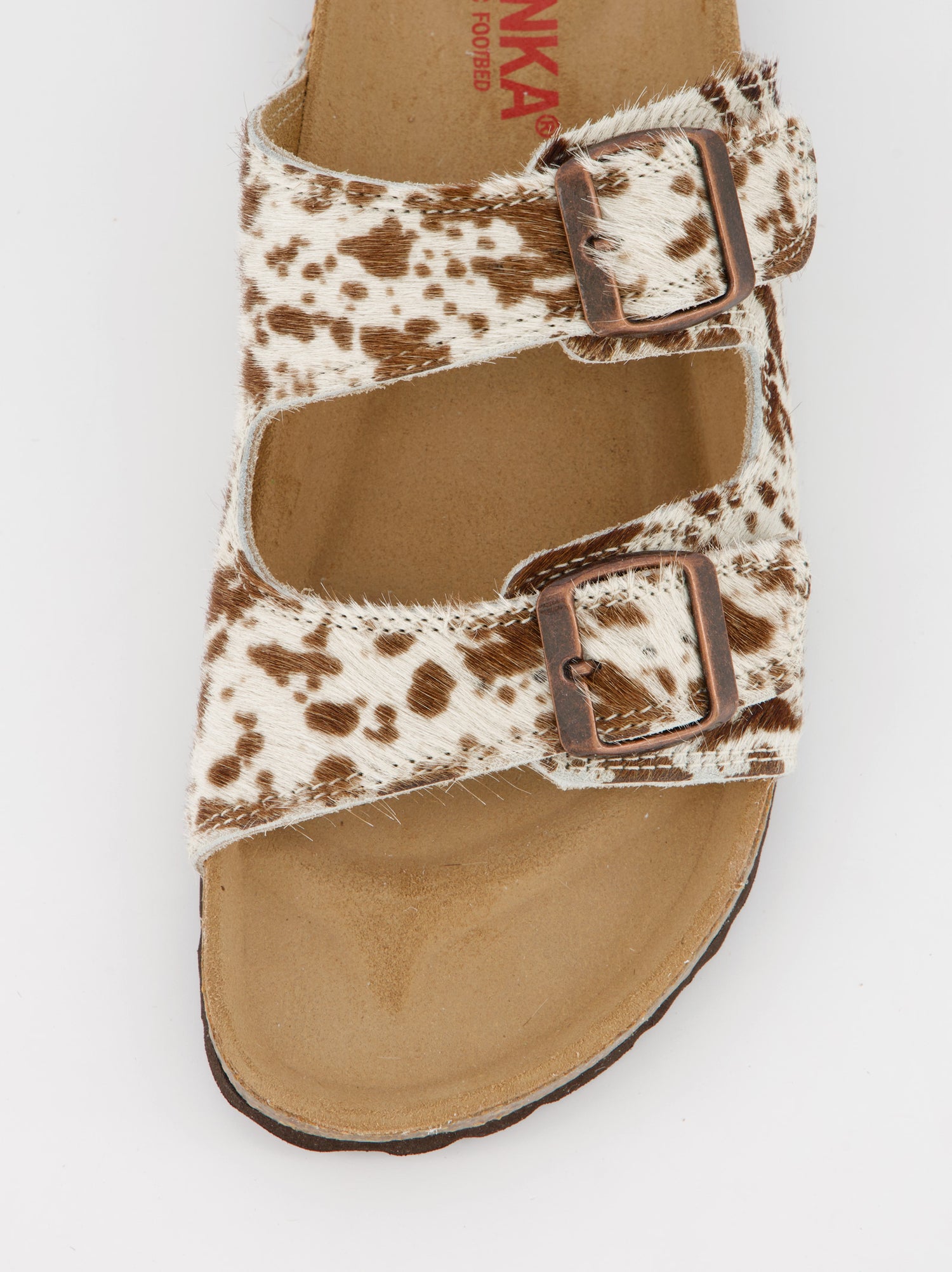 Sandalias planas de pelo con estampado animal