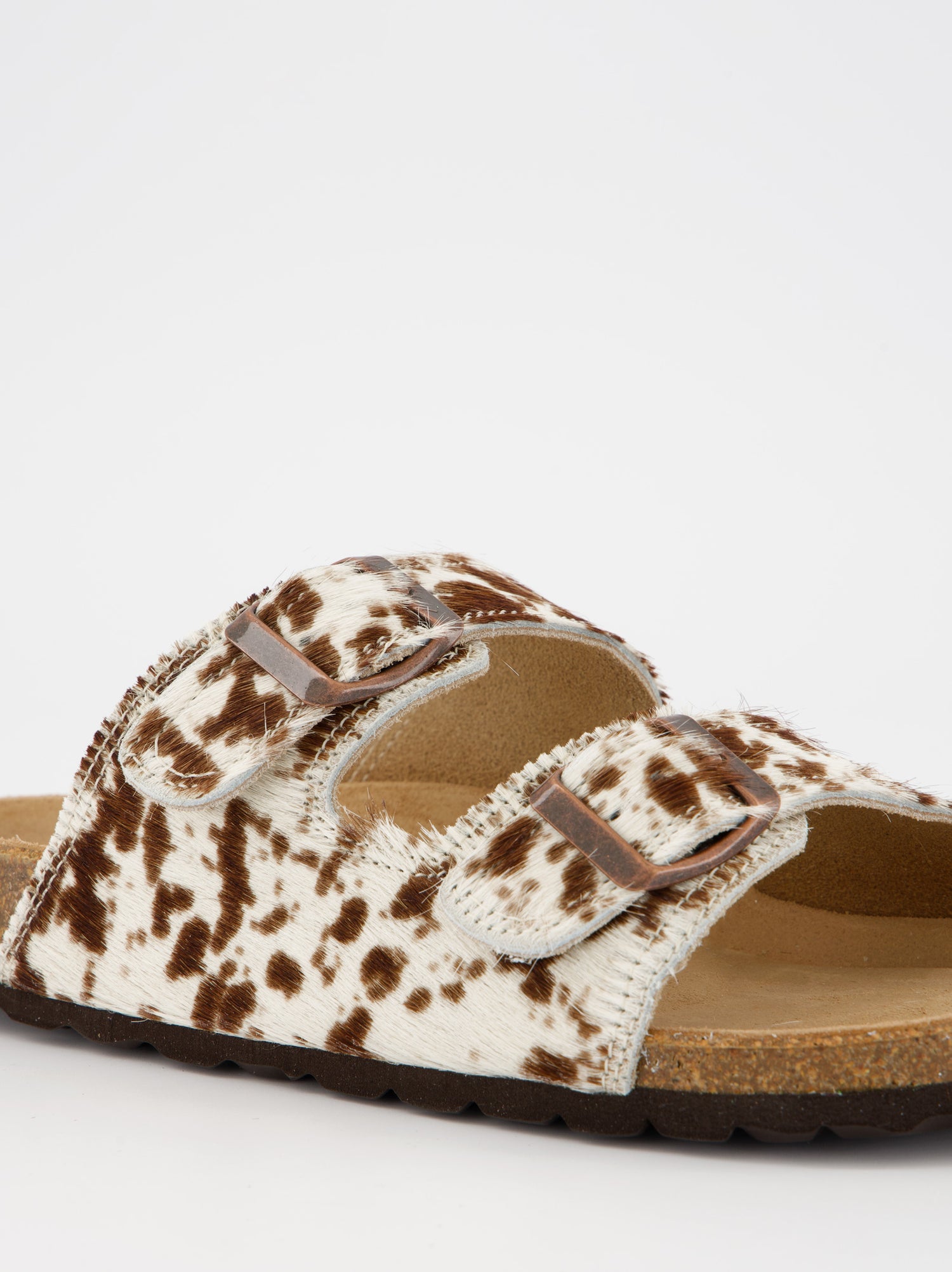 Sandalias planas de pelo con estampado animal