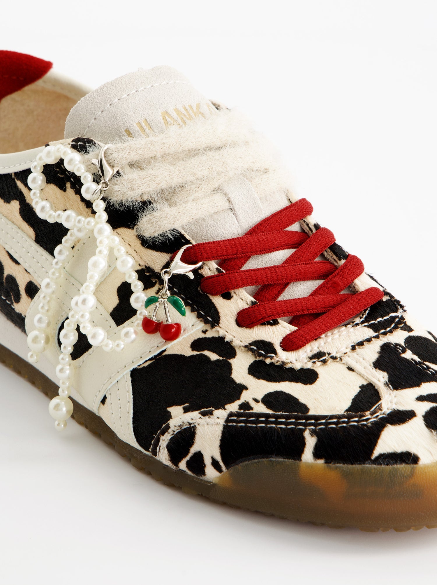 Zapatillas de piel animal print - ULK Onix