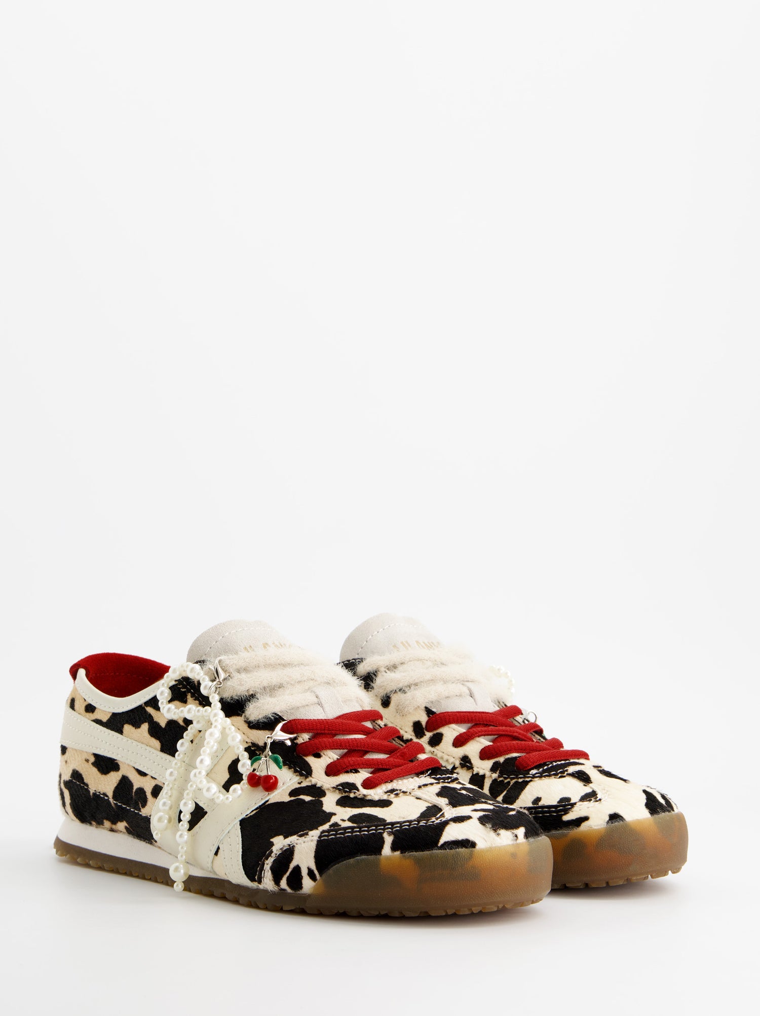 Zapatillas de piel animal print - ULK Onix