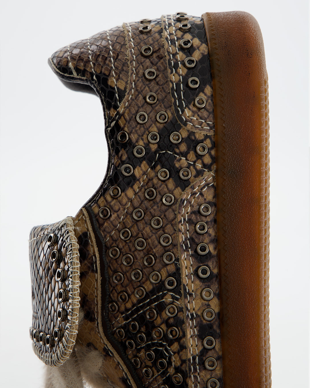 Snake effect sneakers with studs and fur laces - Chile