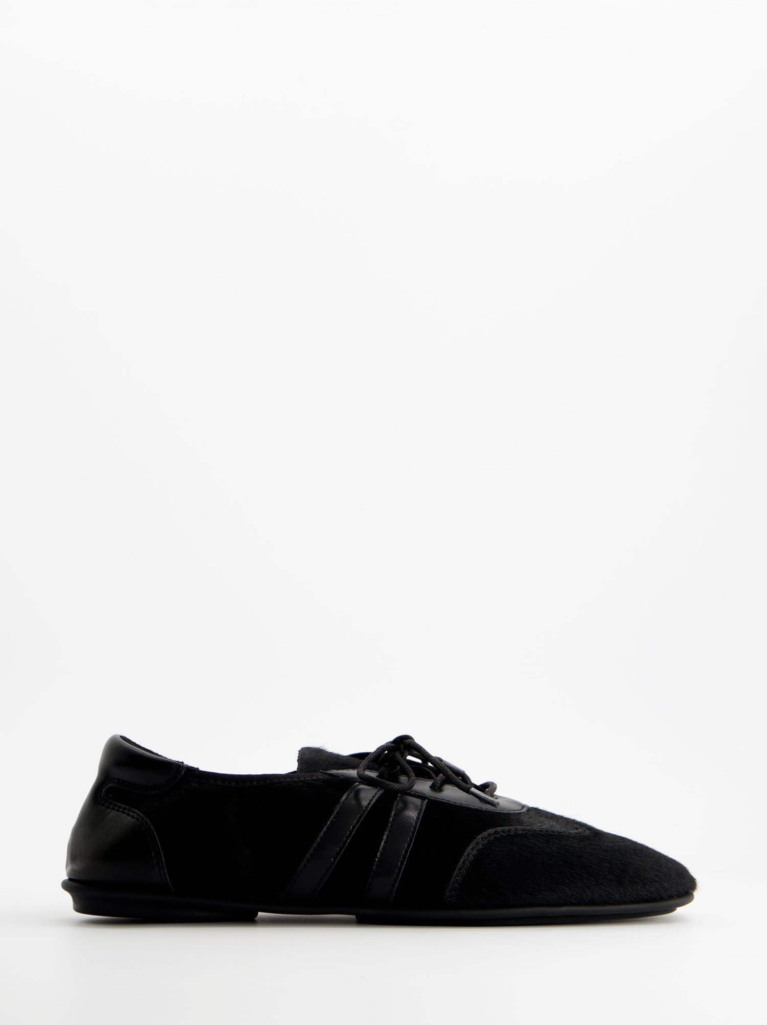 Zapatillas negras de pelo - ULK Lia