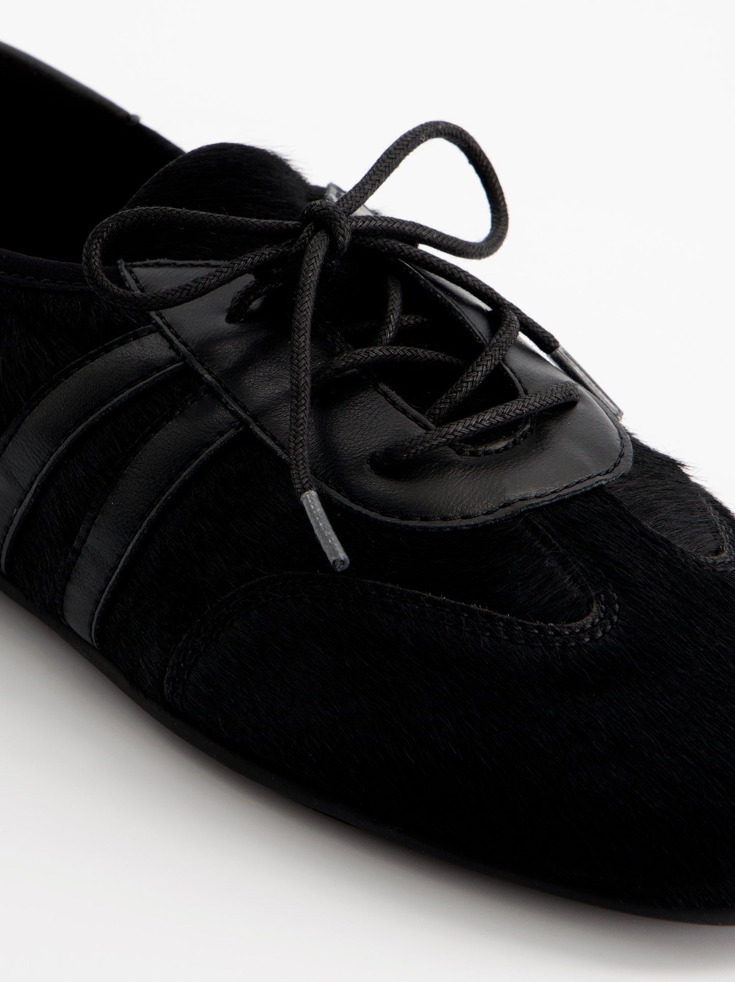 Zapatillas negras de pelo - ULK Lia